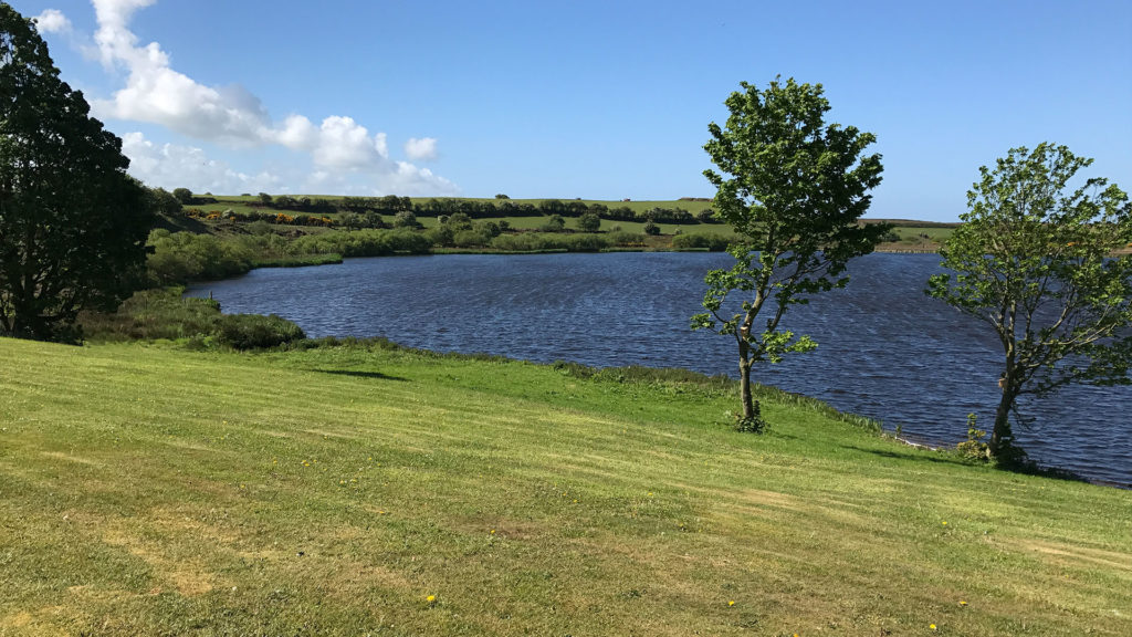 One of the lakes at Brickyard Lakes, representing fishing lodge holidays.